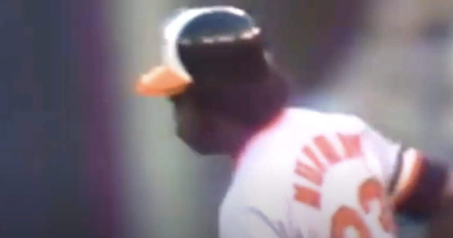 Eddie Murray in action, highlighting his impact in the 80s baseball debate.